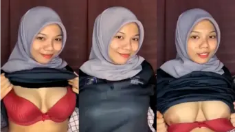 Rista Berjilbab Dengan Payudara Mulus Menggoda Dan Sensual