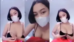 Gadis Berambut Pendek Menggoda Dengan Payudara Yang Menggairahkan